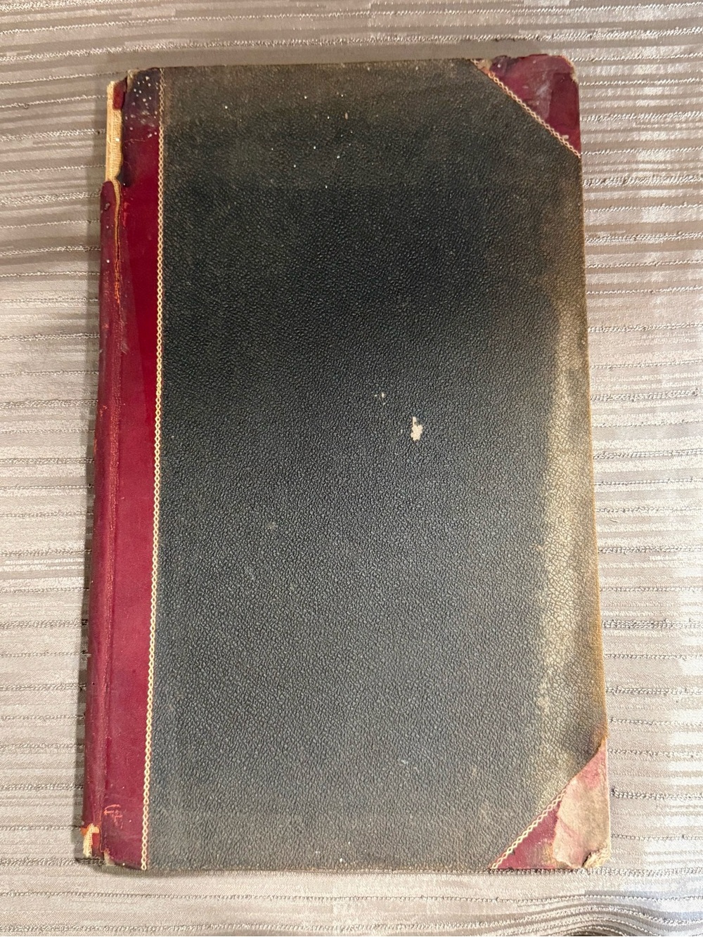 Antique Two-Tone Hardcover Book in Black and Burgundy Store Accounting Ledger
